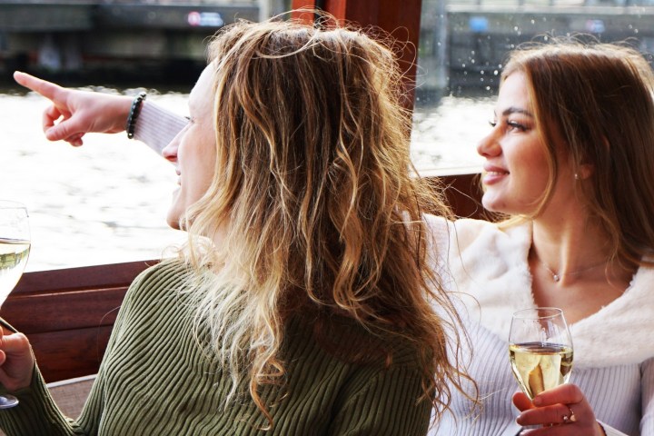 a woman holding a wine glass