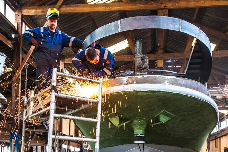 a man standing in front of a building