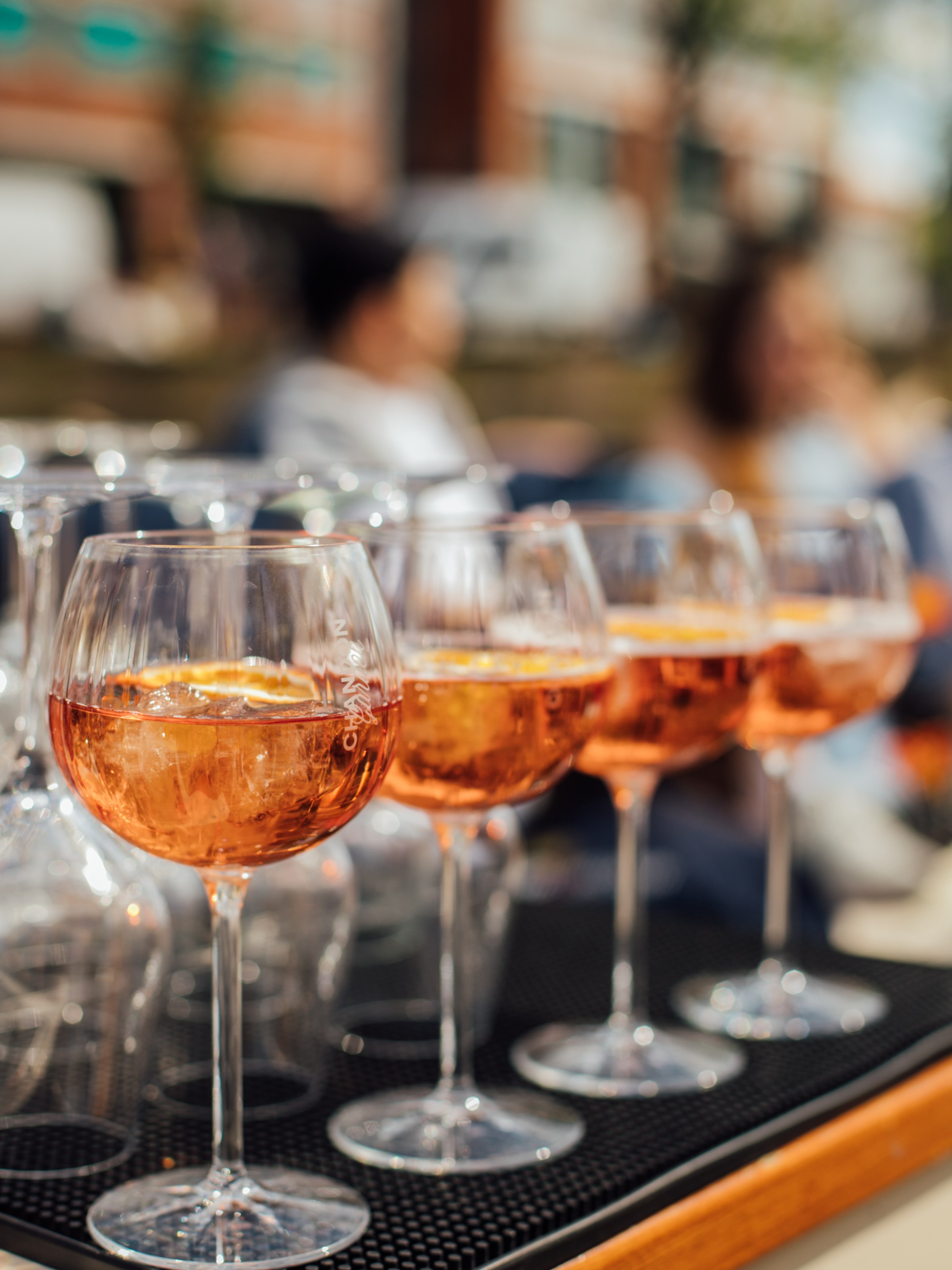 a table filled with wine glasses