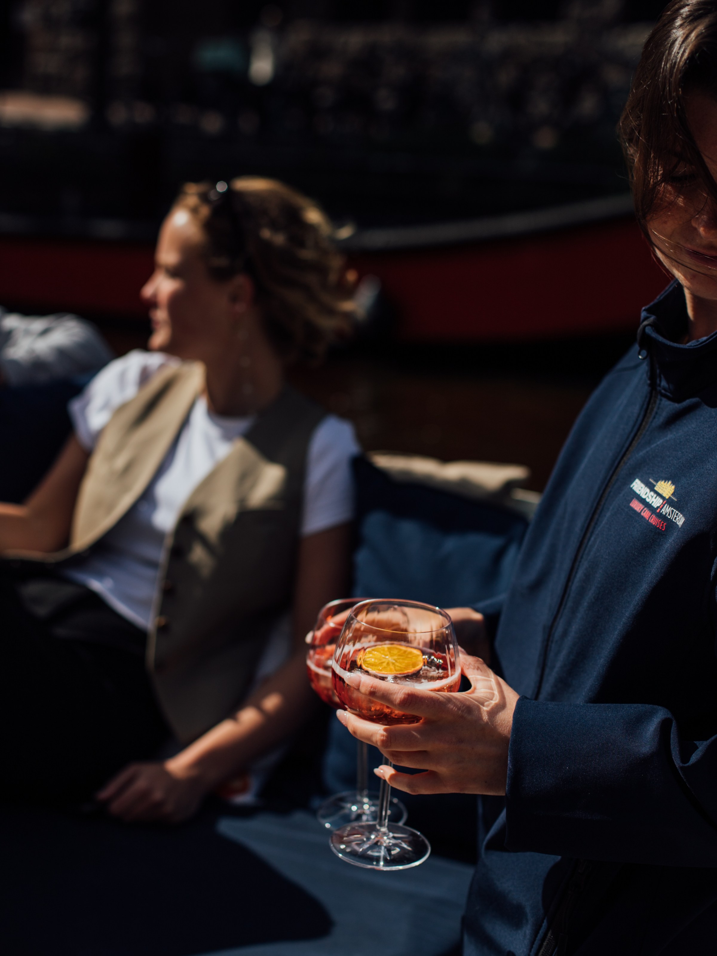 a person holding a wine glass